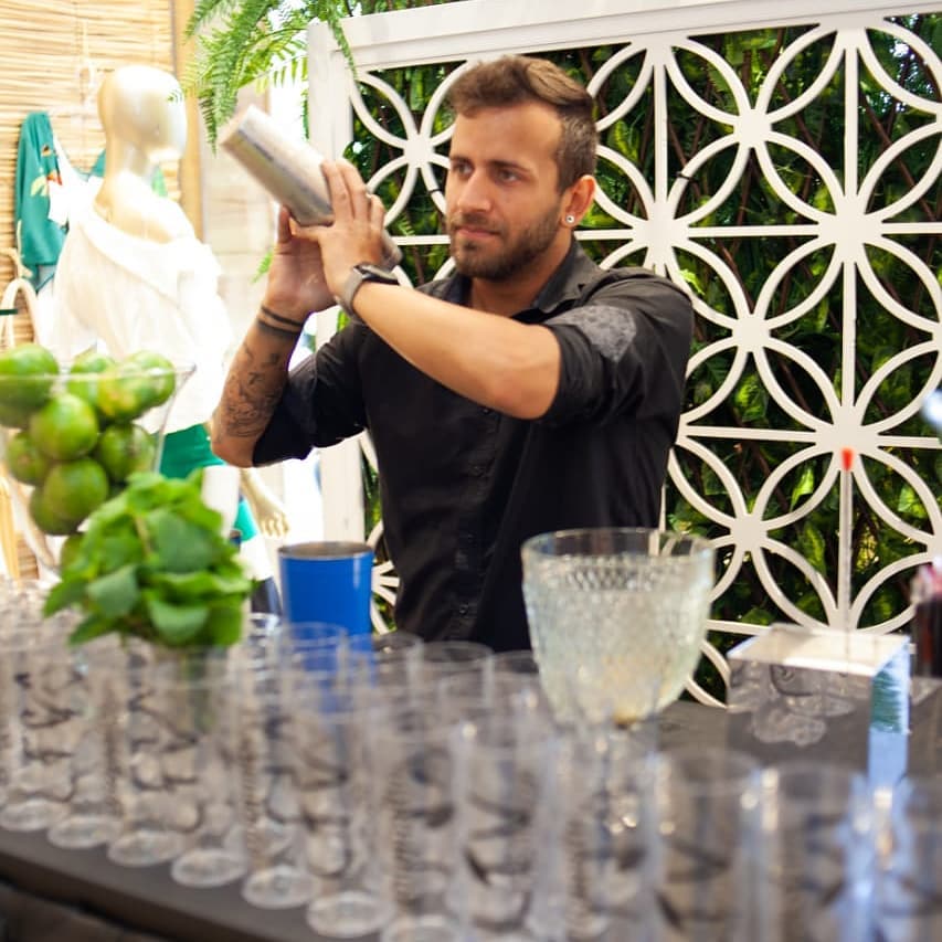 Mackenzie bartending